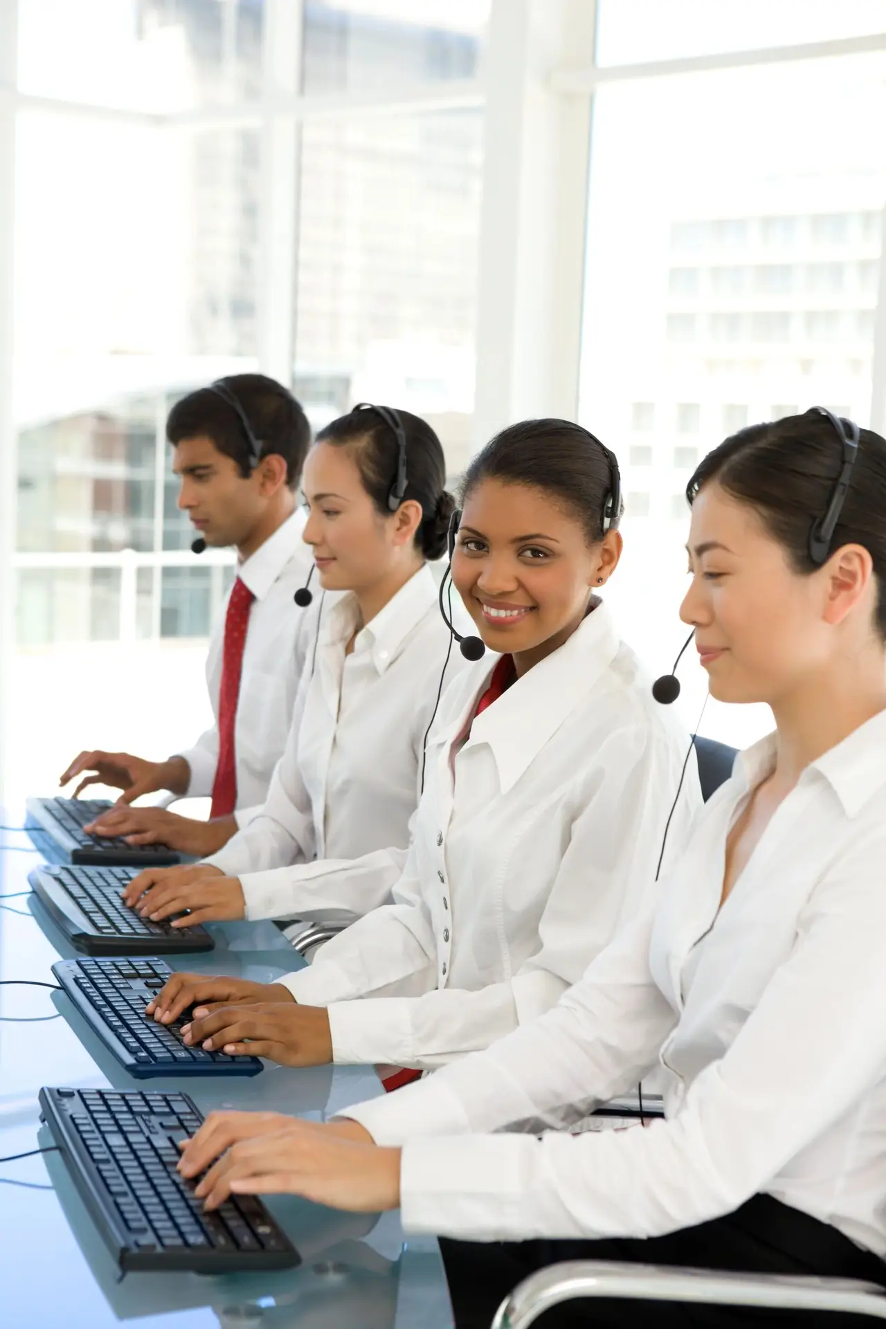 Support team assisting customers online
